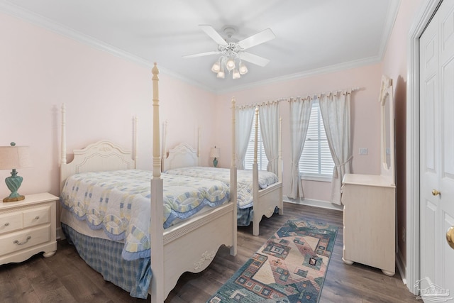 bedroom with dark wood-style floors, ornamental molding, and a ceiling fan