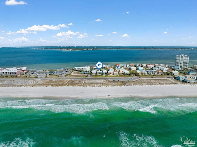 drone / aerial view with a water view and a view of the beach