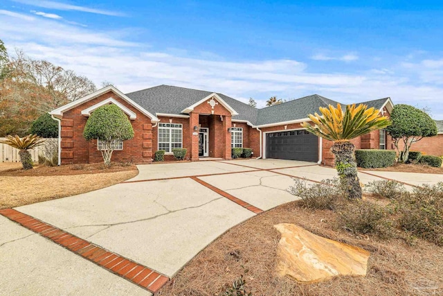 single story home featuring a garage