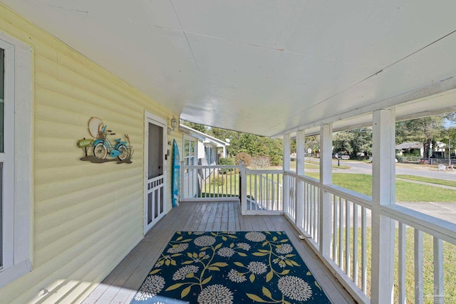 deck with covered porch