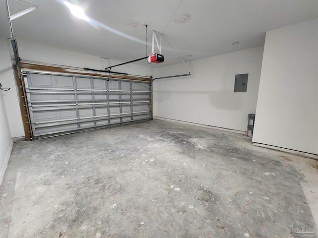 garage with electric panel and a garage door opener