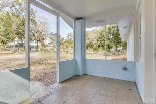 view of unfurnished sunroom