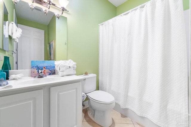 full bathroom with toilet, vanity, tile patterned floors, and shower / tub combo with curtain