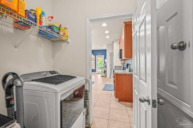 5409 Dalton Cir, Milton, FL 32570 - laundry room with light tile patterned floors and recessed lighting