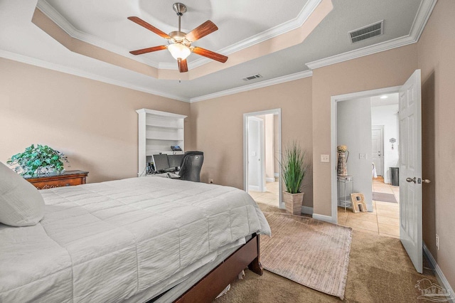 5409 Dalton Cir, Milton, FL 32570 - bedroom with a tray ceiling, ornamental molding, carpet flooring, and a ceiling fan