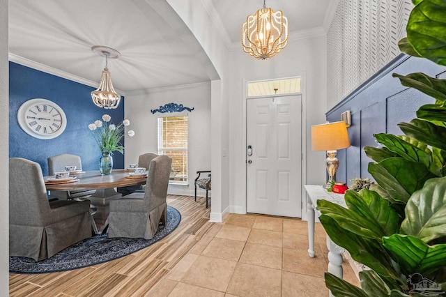 5409 Dalton Cir, Milton, FL 32570 - foyer entrance with a chandelier and crown molding
