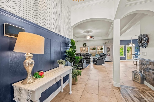 5409 Dalton Cir, Milton, FL 32570 - interior space with tile patterned flooring, ornamental molding, and arched walkways