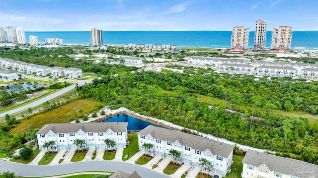 bird's eye view with a water view