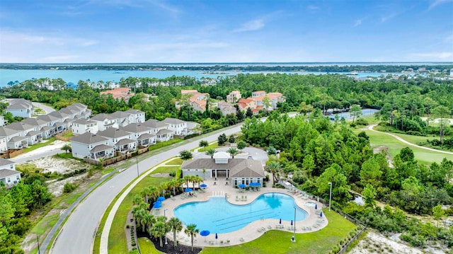 drone / aerial view with a water view