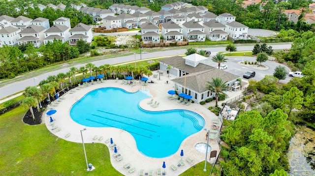 view of swimming pool with a patio area