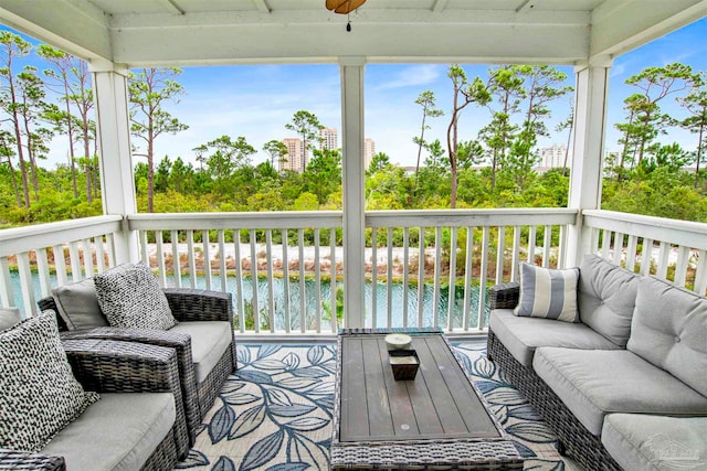 wooden terrace with a water view