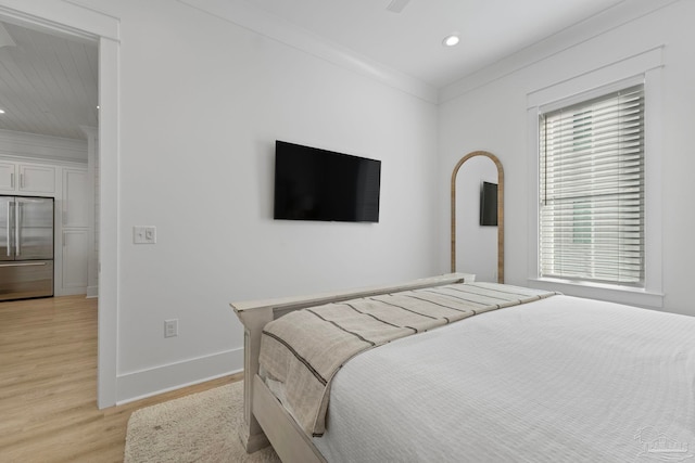 bedroom with light wood finished floors, crown molding, baseboards, recessed lighting, and high quality fridge