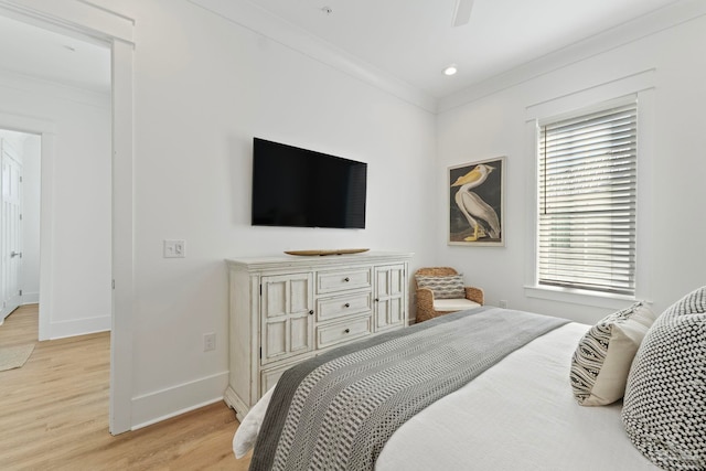 bedroom featuring recessed lighting, baseboards, light wood-style floors, and ornamental molding