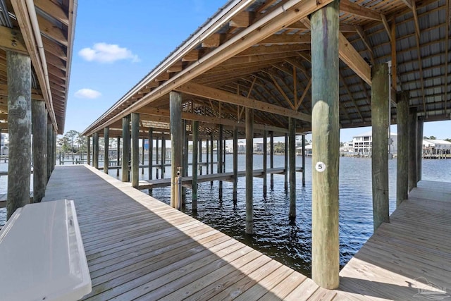 view of dock with a water view