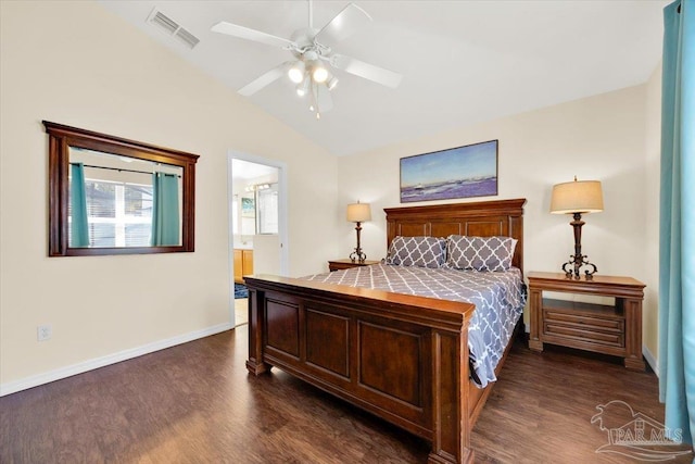 bedroom featuring connected bathroom, ceiling fan, dark wood-type flooring, and lofted ceiling