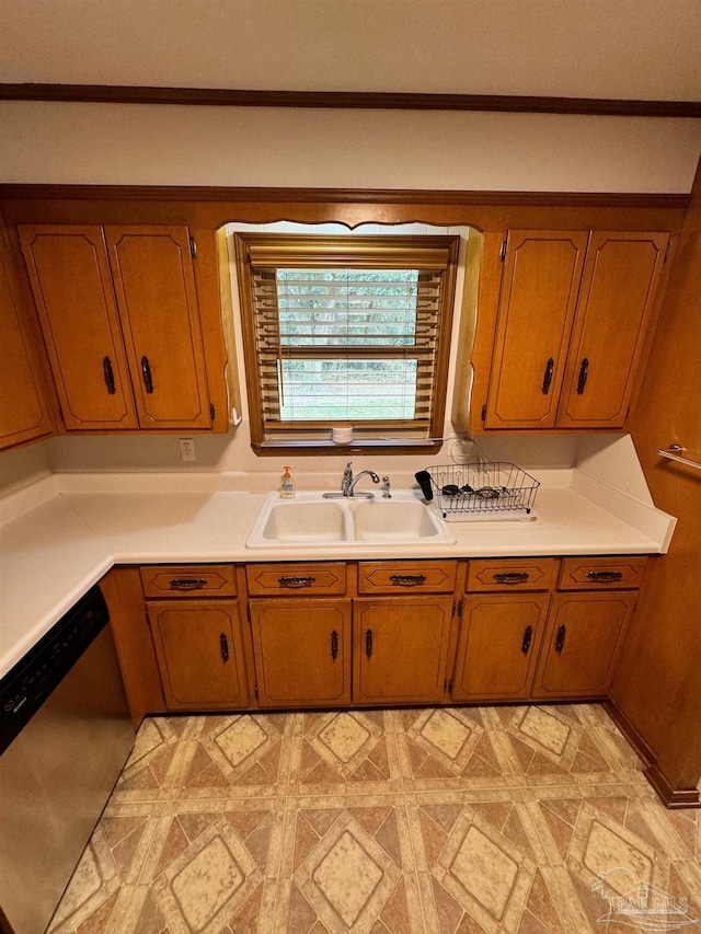 7920 Reeders Ln, Pensacola, FL 32526 - kitchen featuring a sink, stainless steel dishwasher, brown cabinets, light countertops, and light flooring