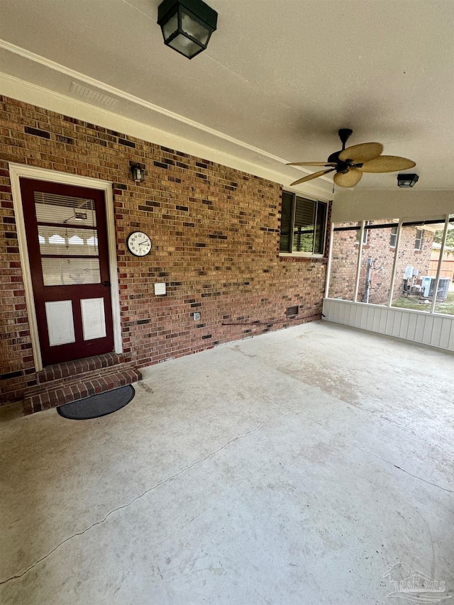 view of patio with ceiling fan