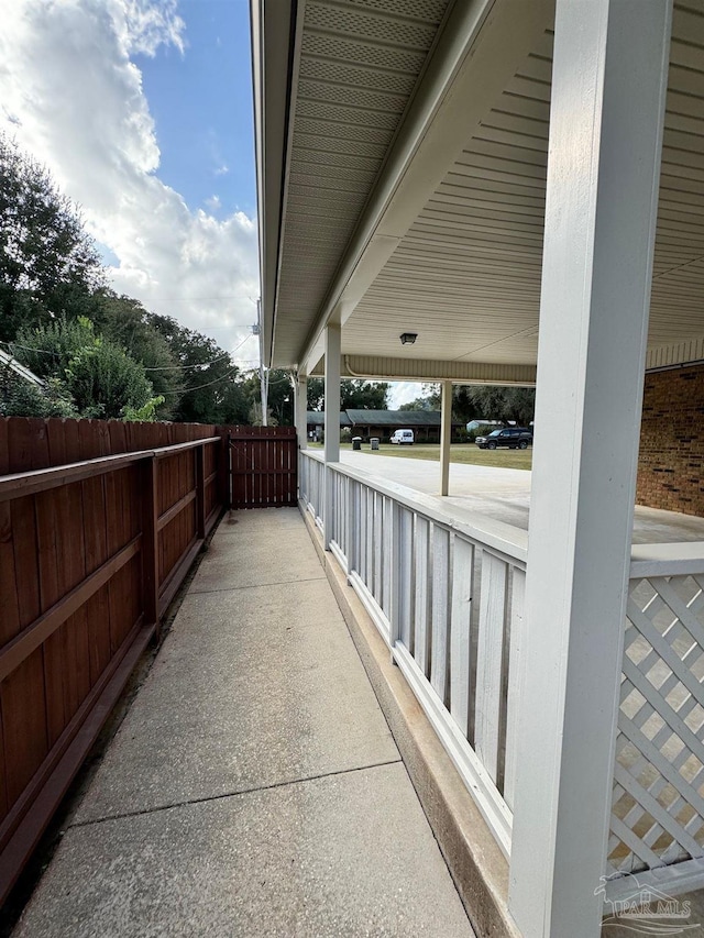 7920 Reeders Ln, Pensacola, FL 32526 - view of patio / terrace with a porch and fence