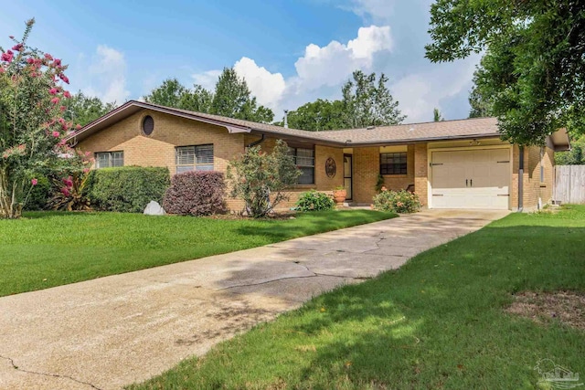6031 Keating Rd, Pensacola, FL 32504 - ranch-style home with brick siding, an attached garage, driveway, and a front yard