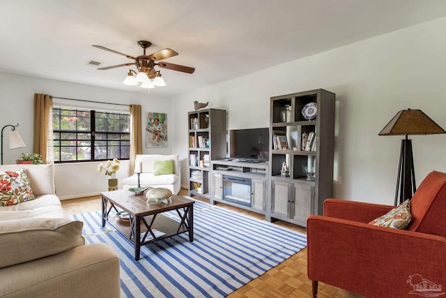 6031 Keating Rd, Pensacola, FL 32504 - living room with ceiling fan and baseboards