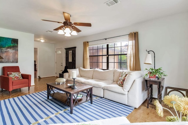 6031 Keating Rd, Pensacola, FL 32504 - living area featuring ceiling fan and baseboards