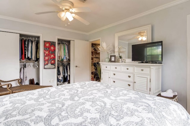 6031 Keating Rd, Pensacola, FL 32504 - bedroom with two closets, ornamental molding, and ceiling fan
