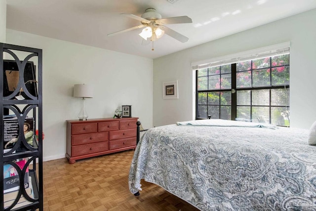 6031 Keating Rd, Pensacola, FL 32504 - bedroom featuring a ceiling fan and baseboards