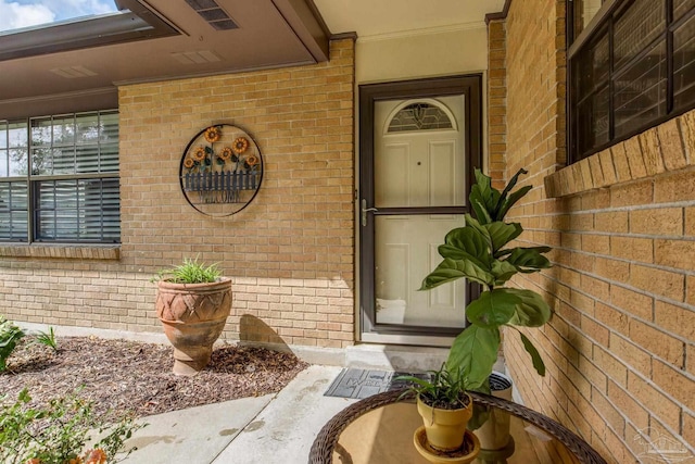 6031 Keating Rd, Pensacola, FL 32504 - entrance to property featuring brick siding and a porch