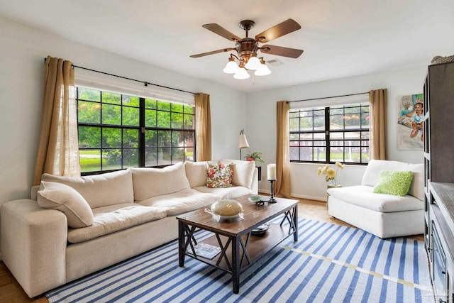 6031 Keating Rd, Pensacola, FL 32504 - living room with plenty of natural light and a ceiling fan