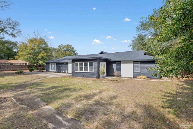 view of front of home with a front yard