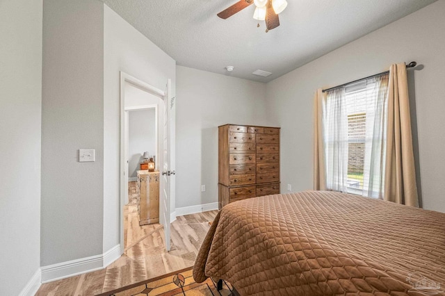 8056 Stream Ridge Rd, Pensacola, FL 32526 - bedroom with light wood-style flooring, baseboards, and ceiling fan