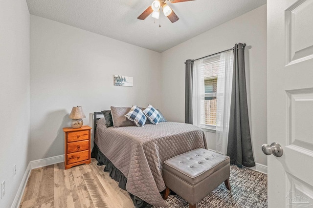 8056 Stream Ridge Rd, Pensacola, FL 32526 - bedroom featuring baseboards, light wood finished floors, and a ceiling fan