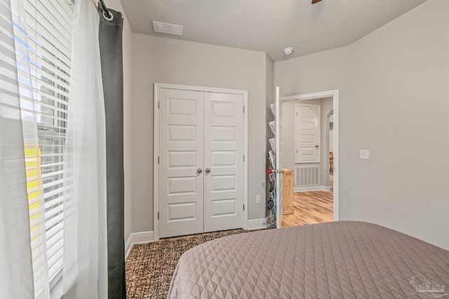 8056 Stream Ridge Rd, Pensacola, FL 32526 - bedroom featuring a closet, carpet flooring, and baseboards