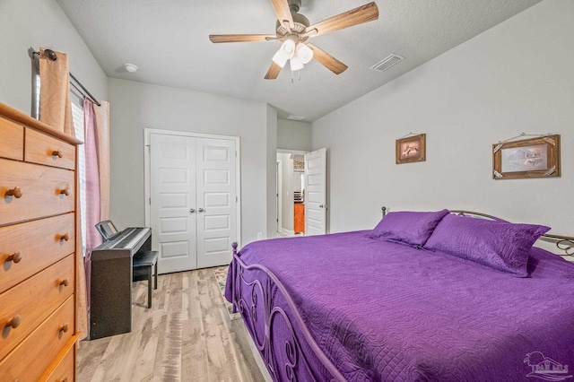 8056 Stream Ridge Rd, Pensacola, FL 32526 - bedroom with light wood finished floors, a ceiling fan, and a closet
