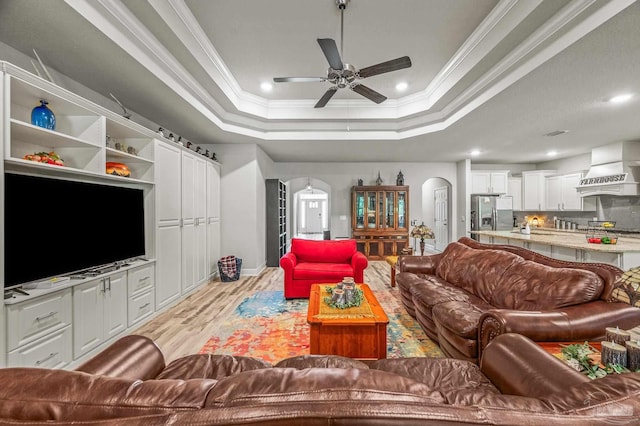 8056 Stream Ridge Rd, Pensacola, FL 32526 - living area with light wood-style flooring, ceiling fan, ornamental molding, arched walkways, and recessed lighting