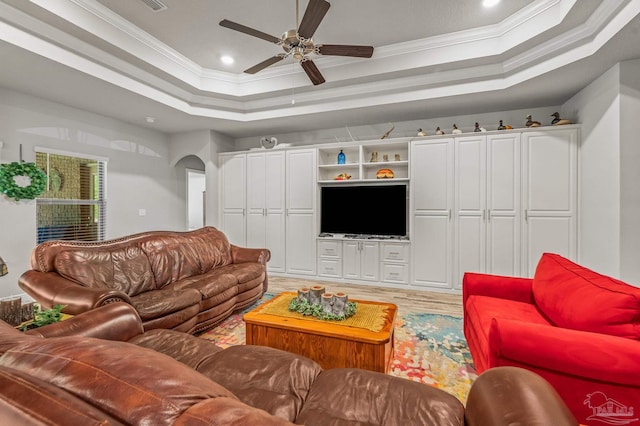 8056 Stream Ridge Rd, Pensacola, FL 32526 - living room with a tray ceiling, light wood finished floors, crown molding, recessed lighting, and a ceiling fan