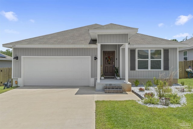 6173 Native Dancer Way, Pensacola, FL 32526 - ranch-style house with roof with shingles, a garage, and concrete driveway