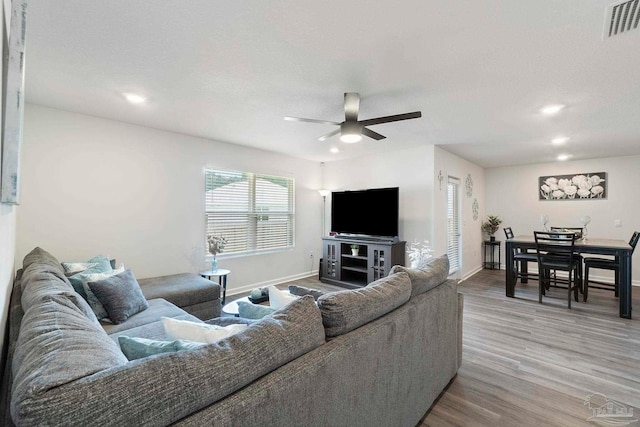 6173 Native Dancer Way, Pensacola, FL 32526 - living area with ceiling fan, light wood finished floors, and recessed lighting