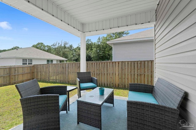 6173 Native Dancer Way, Pensacola, FL 32526 - fenced backyard with a patio and outdoor lounge area