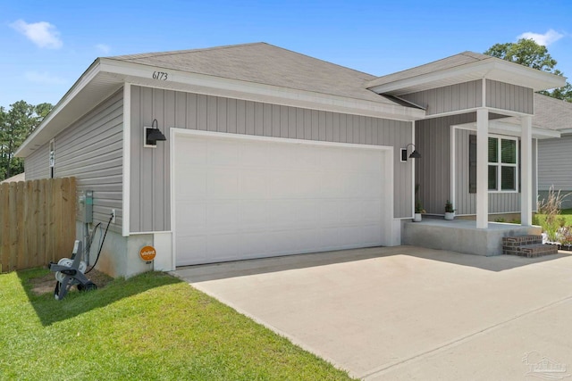 6173 Native Dancer Way, Pensacola, FL 32526 - view of front of home with a shingled roof, driveway, and a garage