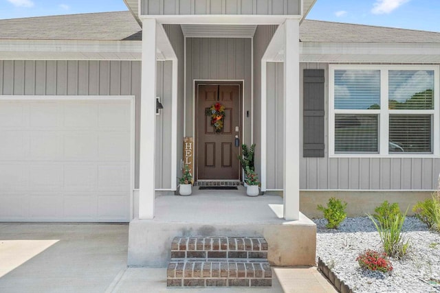 6173 Native Dancer Way, Pensacola, FL 32526 - entrance to property featuring an attached garage, driveway, and roof with shingles