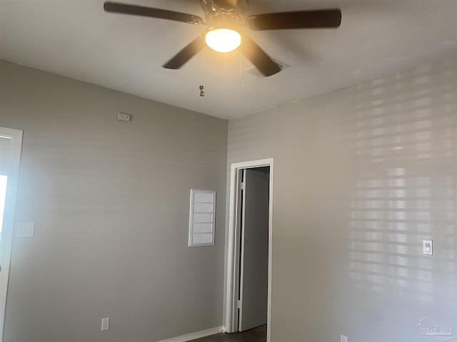 empty room with ceiling fan