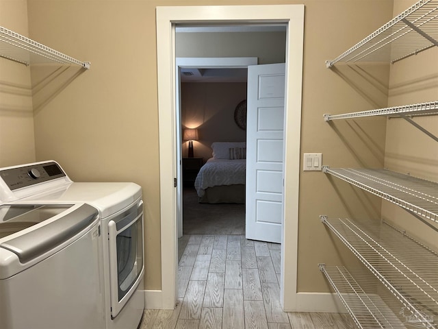 1792 Galvez Dr, Gulf Breeze, FL 32563 - clothes washing area with independent washer and dryer