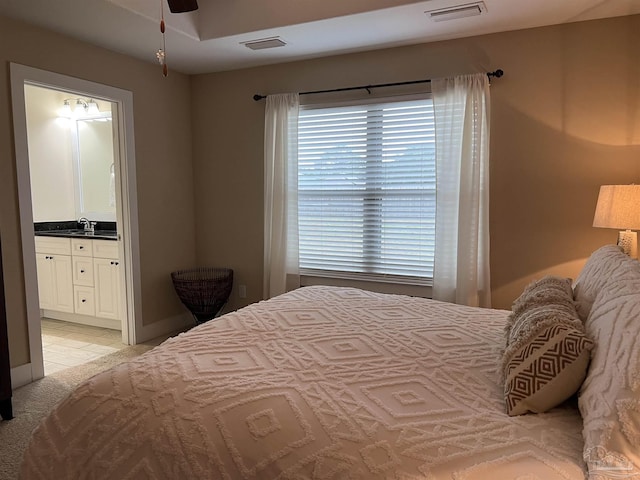 1792 Galvez Dr, Gulf Breeze, FL 32563 - bedroom featuring connected bathroom and sink