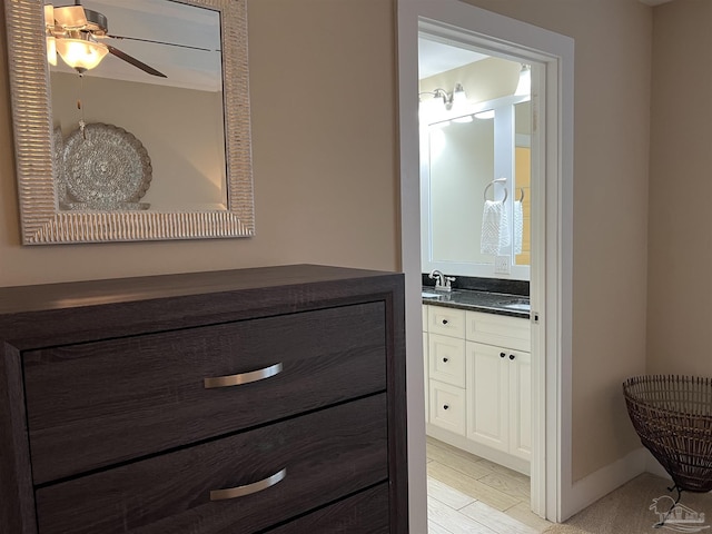 1792 Galvez Dr, Gulf Breeze, FL 32563 - bathroom featuring vanity, hardwood / wood-style flooring, and ceiling fan
