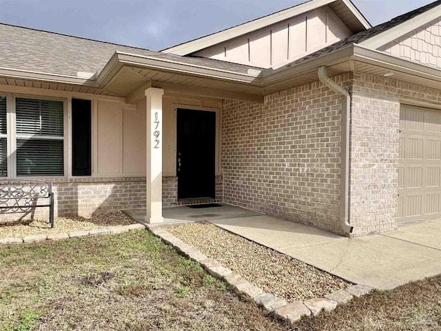 1792 Galvez Dr, Gulf Breeze, FL 32563 - doorway to property featuring a garage