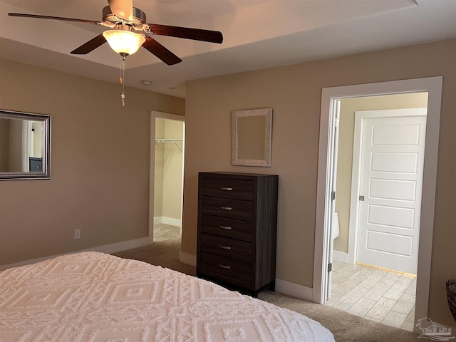 1792 Galvez Dr, Gulf Breeze, FL 32563 - bedroom featuring ceiling fan, a spacious closet, light colored carpet, and a closet