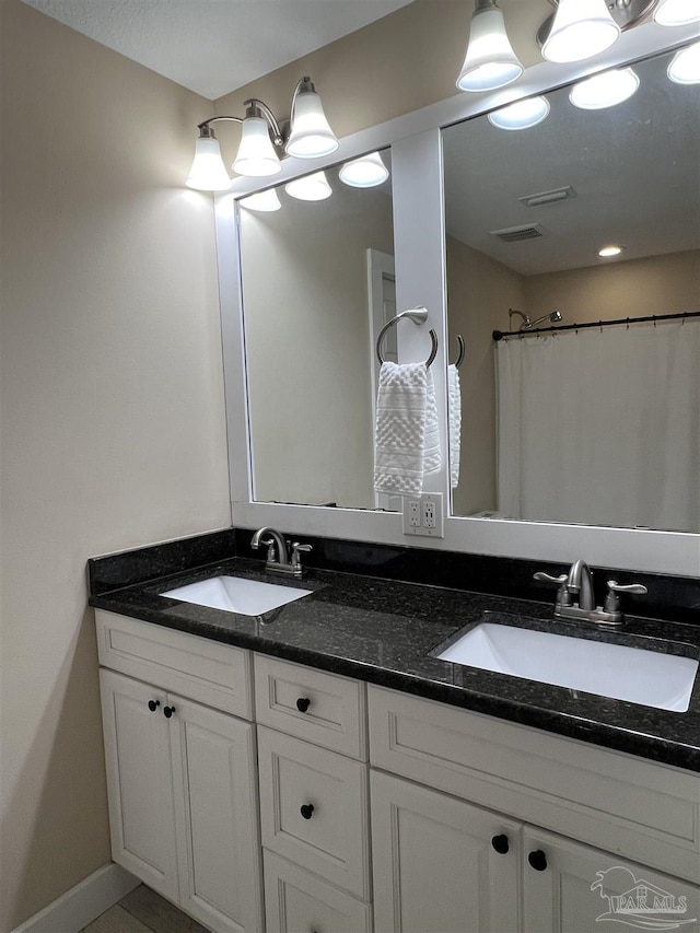 1792 Galvez Dr, Gulf Breeze, FL 32563 - bathroom with vanity and a shower with curtain