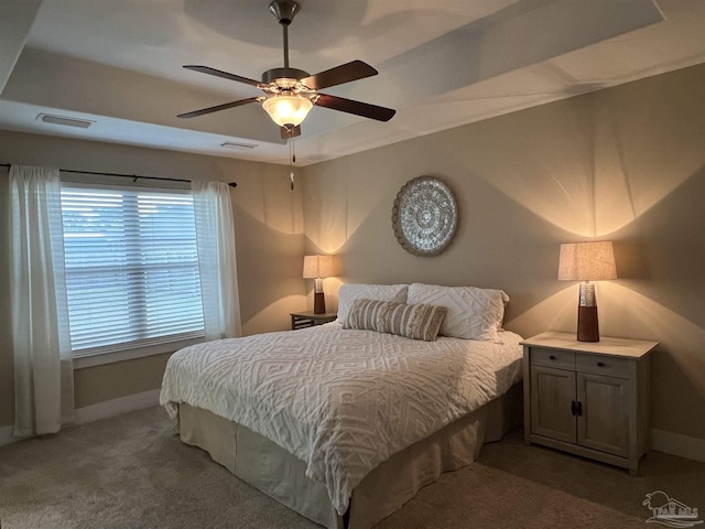 1792 Galvez Dr, Gulf Breeze, FL 32563 - bedroom featuring ceiling fan, carpet flooring, and a tray ceiling