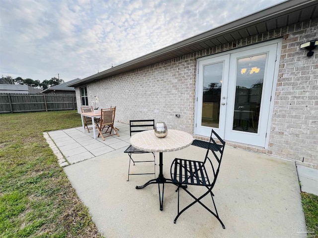 1792 Galvez Dr, Gulf Breeze, FL 32563 - view of patio featuring french doors